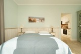 Ferienwohnung in Fehmarn OT Fehmarnsund - Strandresidenz Vogelflug Sundblick - Bild 25